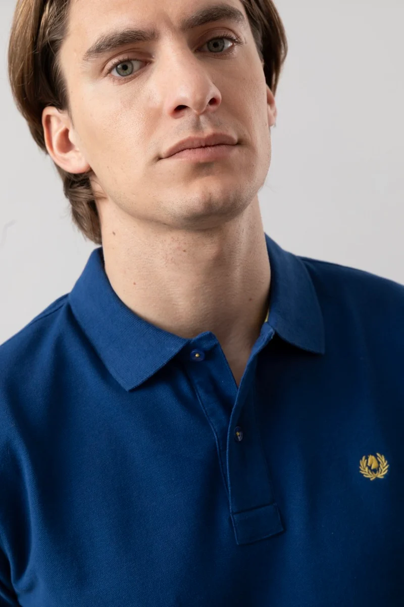 Polo in piquet di cotone con logo ricamato a contrasto
