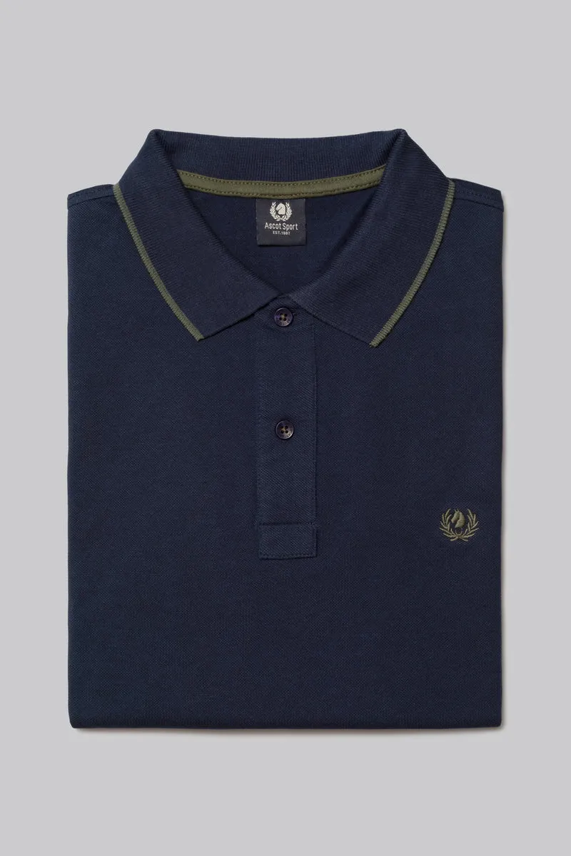 Polo in piquet con riga contrasto colore su collo e stampa logo sottocollo