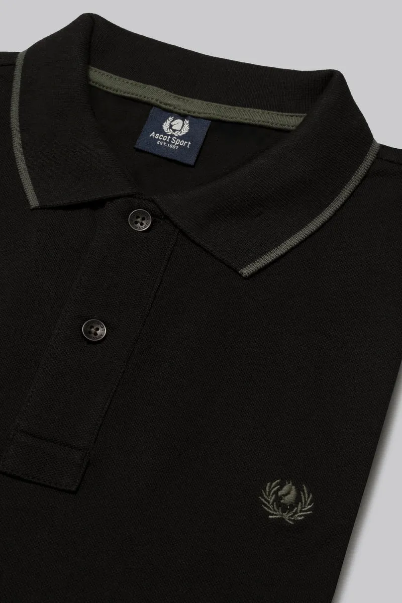 Polo in piquet con riga contrasto colore su collo e stampa logo sottocollo