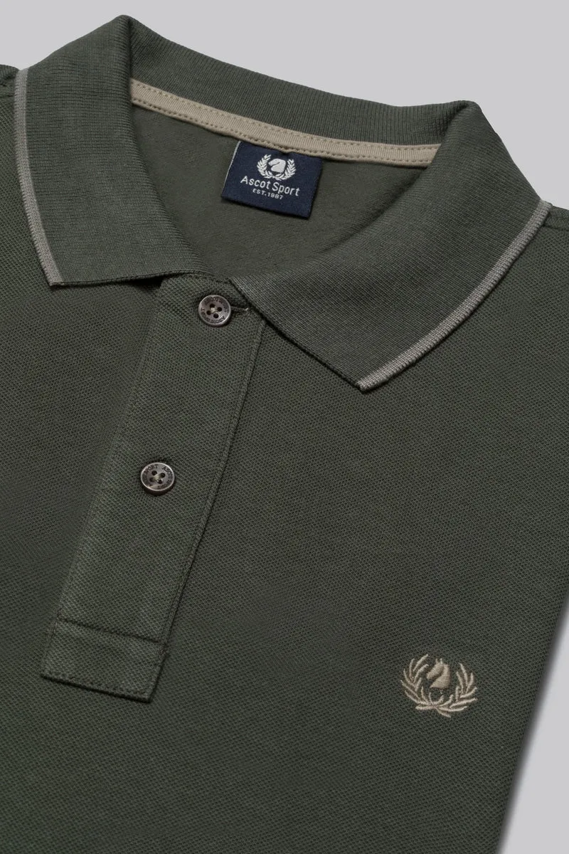 Polo in piquet con riga contrasto colore su collo e stampa logo sottocollo