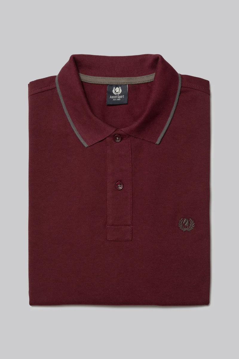 Polo in piquet con riga contrasto colore su collo e stampa logo sottocollo