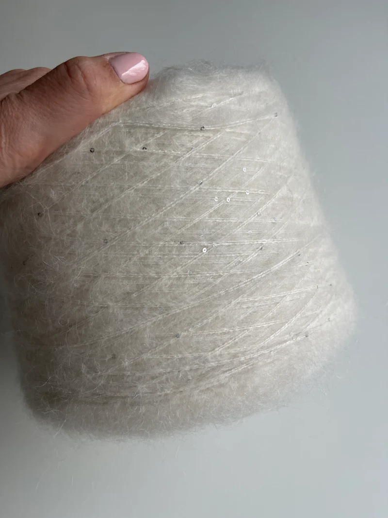 Mix di mohair con paillettes bianche