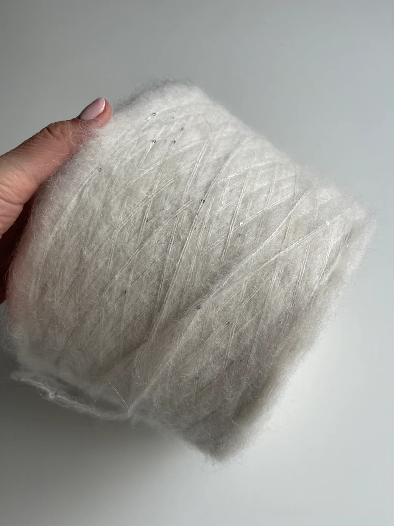 Mix di mohair con paillettes bianche