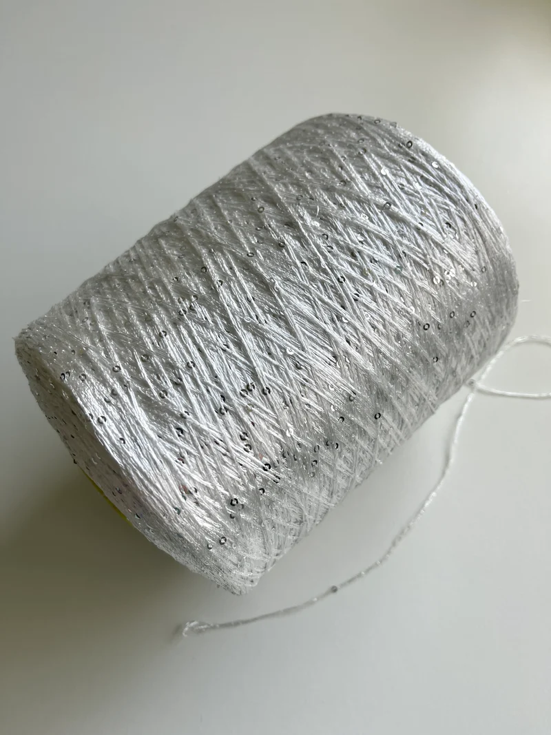 Paillettes Cofil su cono (argento su bianco)