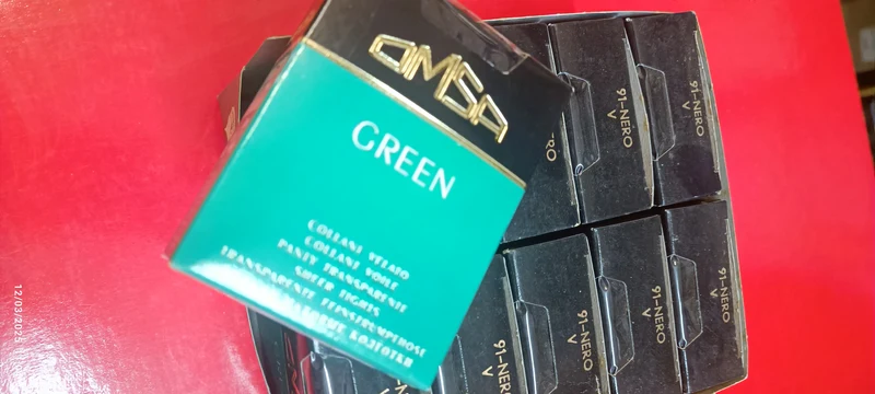 Confezione da 10 collant velato OMSA, taglia V, colore nero. 300g.