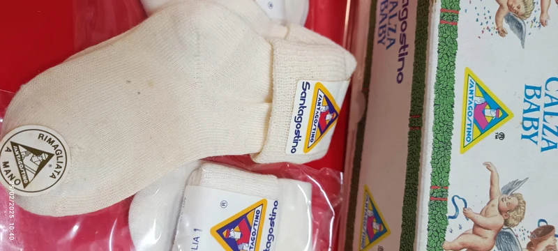 Sette paia di calzini baby bianchi, Santagostino, misura 1. 350 g.
