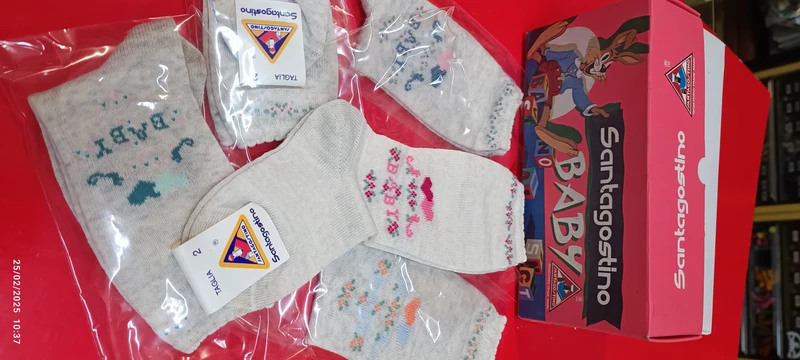 Sette paia di calzini Sant'Agostino Baby melange a fantasia, misto lana, misura 2. 350g.
