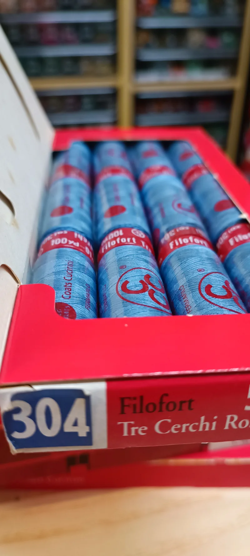 Spagnolette Tre Cerchi Rosso, filo da cucito. Confezione da 12. 100g.