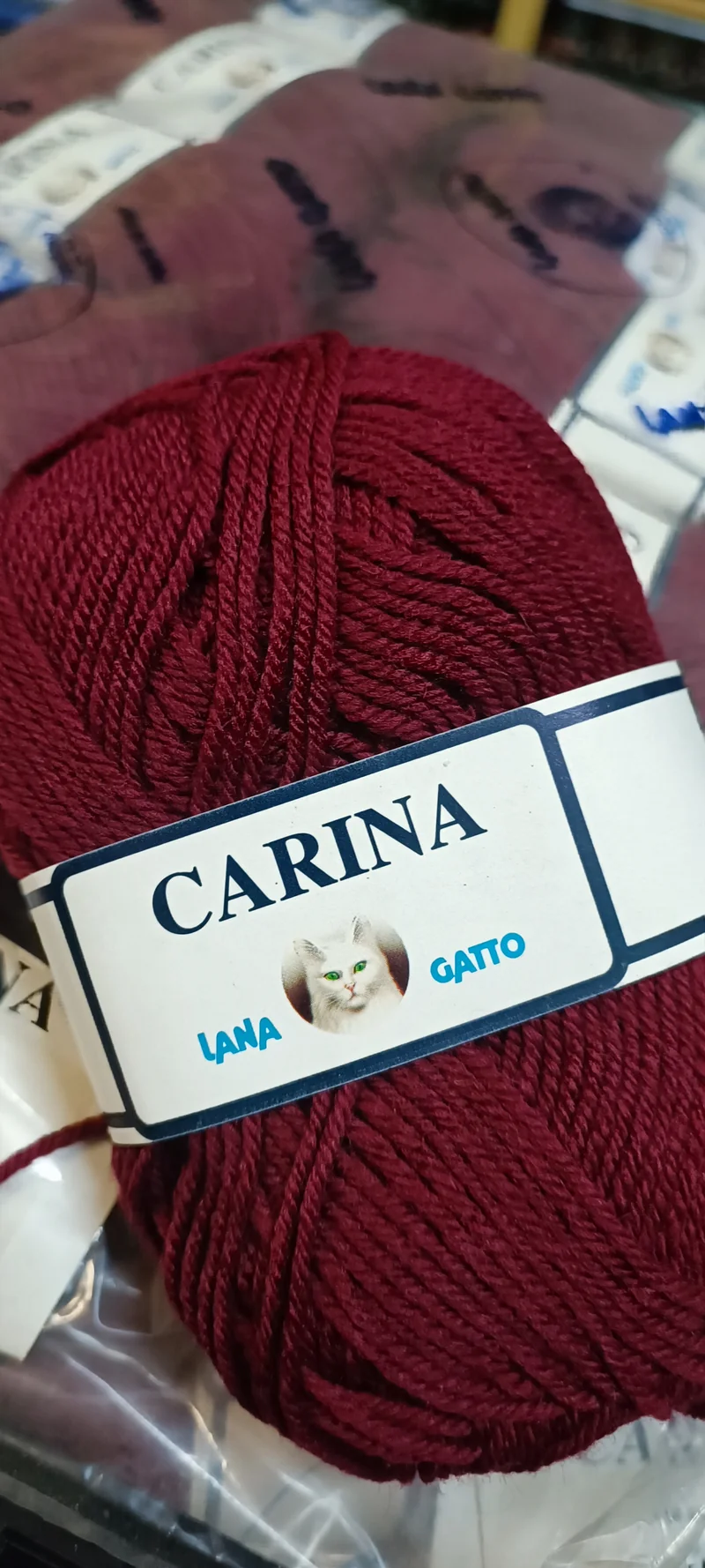 Lana Gatto Carina, Filatura e Tessitura di Tollegno, colori rosa, bordeaux e marrone testa di moro, 70% lana, ferri 4. 500g.