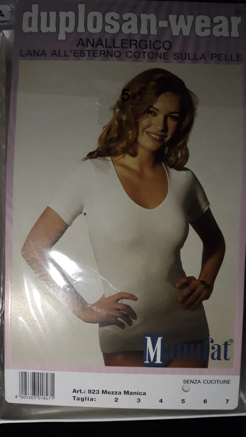 Maglia intima donna Manufat, mezza manica bordo raso, lana esternamente cotone sulla pelle, 100g.