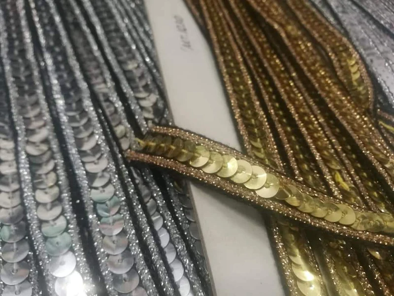 Passamaneria di paillettes, oro e argento.300g.