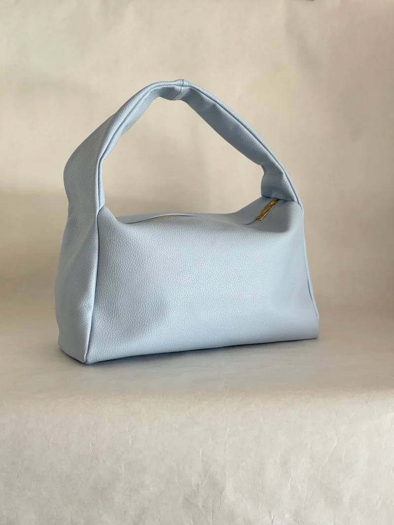 Borsa a spalla effetto “puff” in tonalità macaron