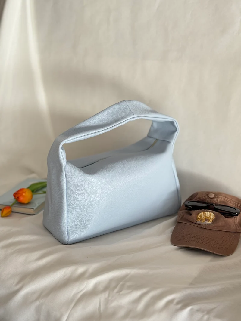 Borsa a spalla effetto “puff” in tonalità macaron