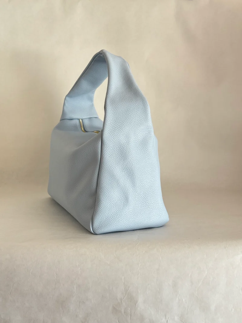 Borsa a spalla effetto “puff” in tonalità macaron