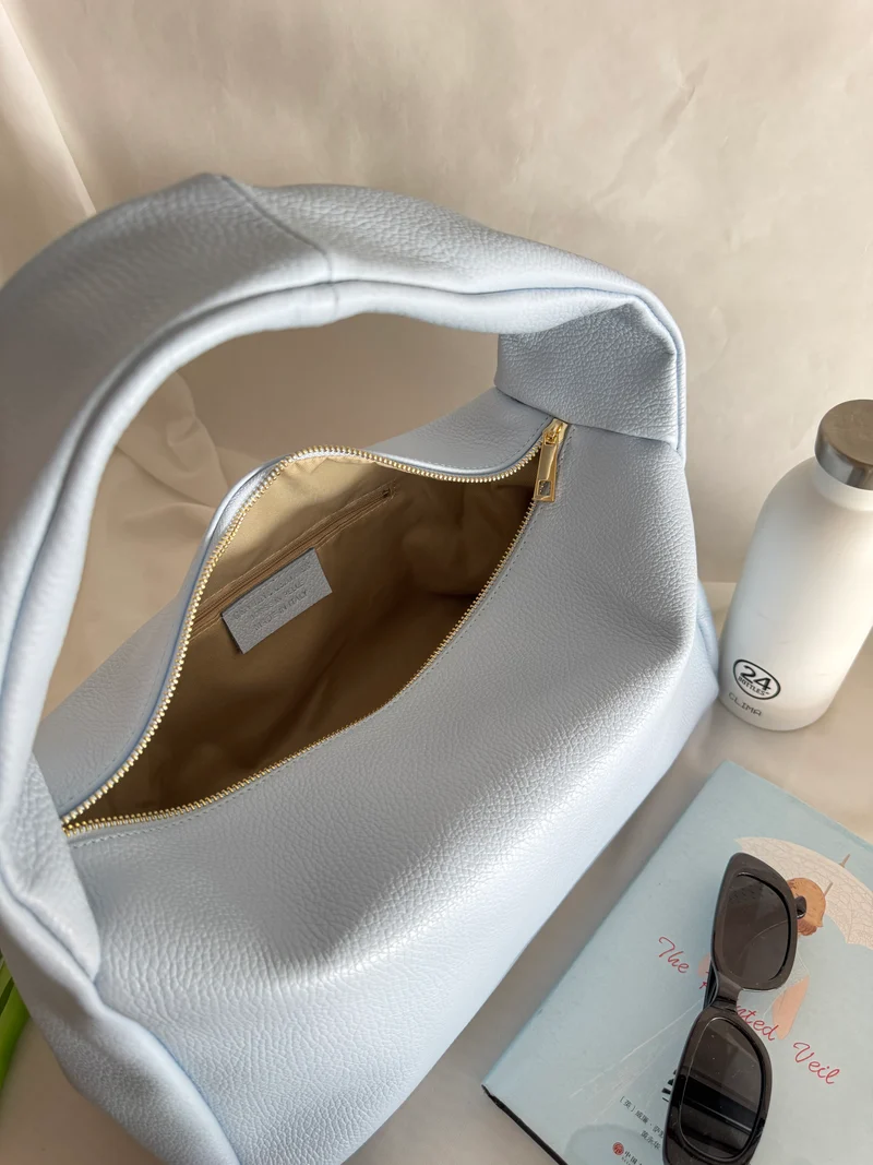 Borsa a spalla effetto “puff” in tonalità macaron