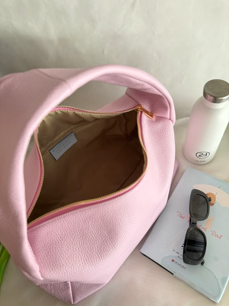 Borsa a spalla effetto “puff” in tonalità macaron