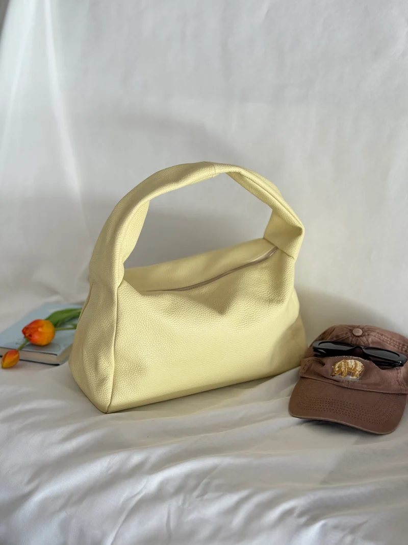 Borsa a spalla effetto “puff” in tonalità macaron