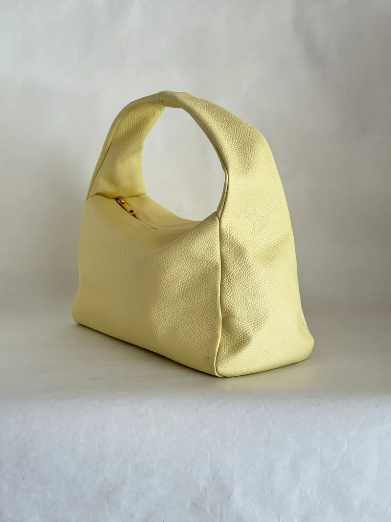 Borsa a spalla effetto “puff” in tonalità macaron