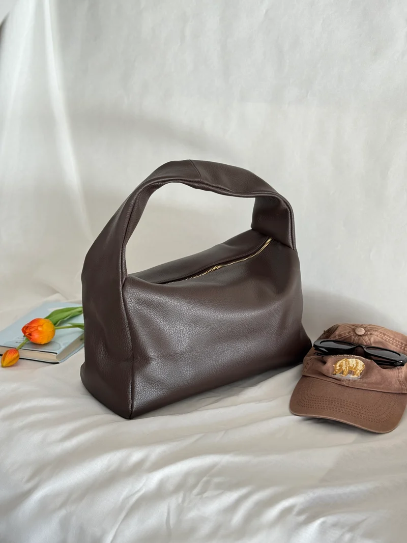 Borsa a spalla effetto “puff” in tonalità macaron