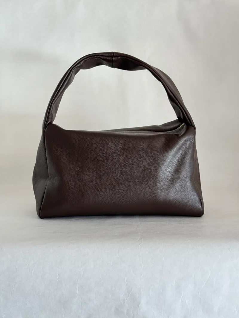 Borsa a spalla effetto “puff” in tonalità macaron