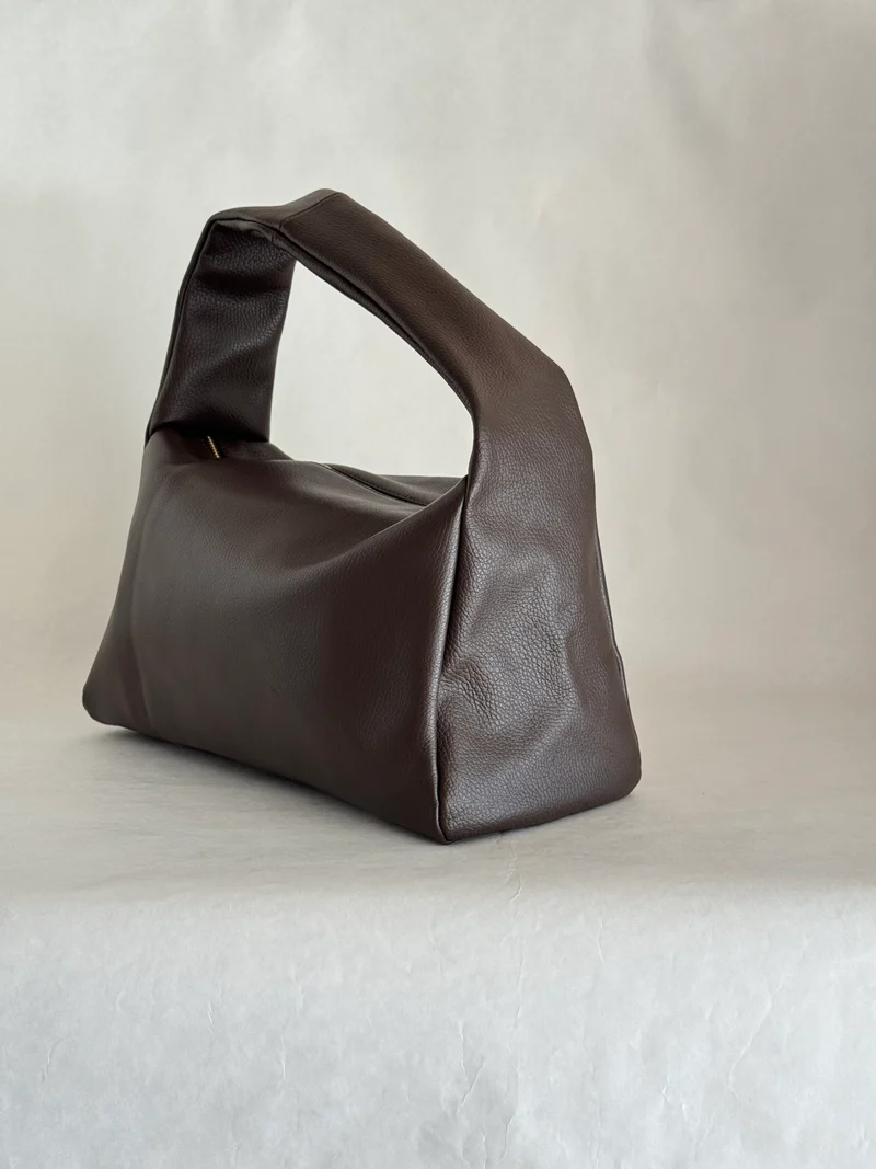 Borsa a spalla effetto “puff” in tonalità macaron
