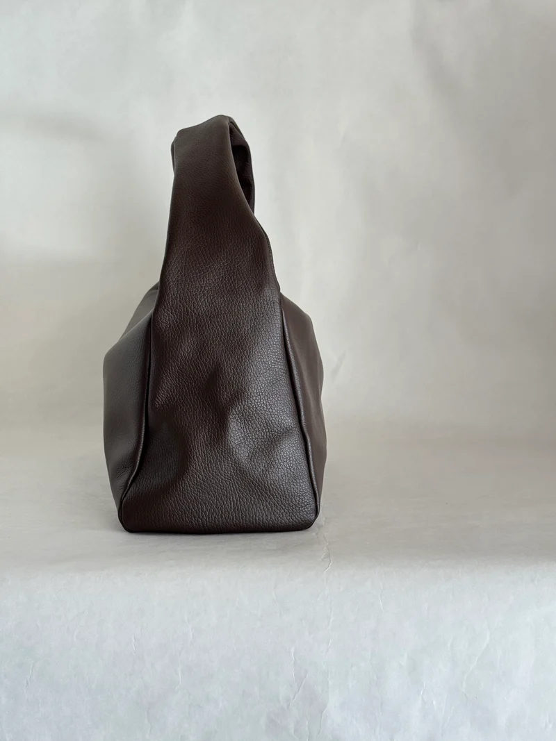 Borsa a spalla effetto “puff” in tonalità macaron