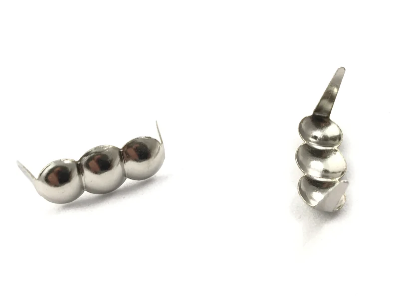 Borchie trio metalliche cf.10pz