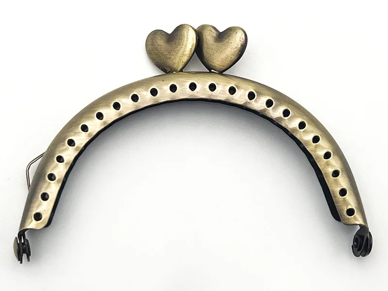 Chiusura clic clac due cuori per borse | 8,5 cm | cf 1 pz